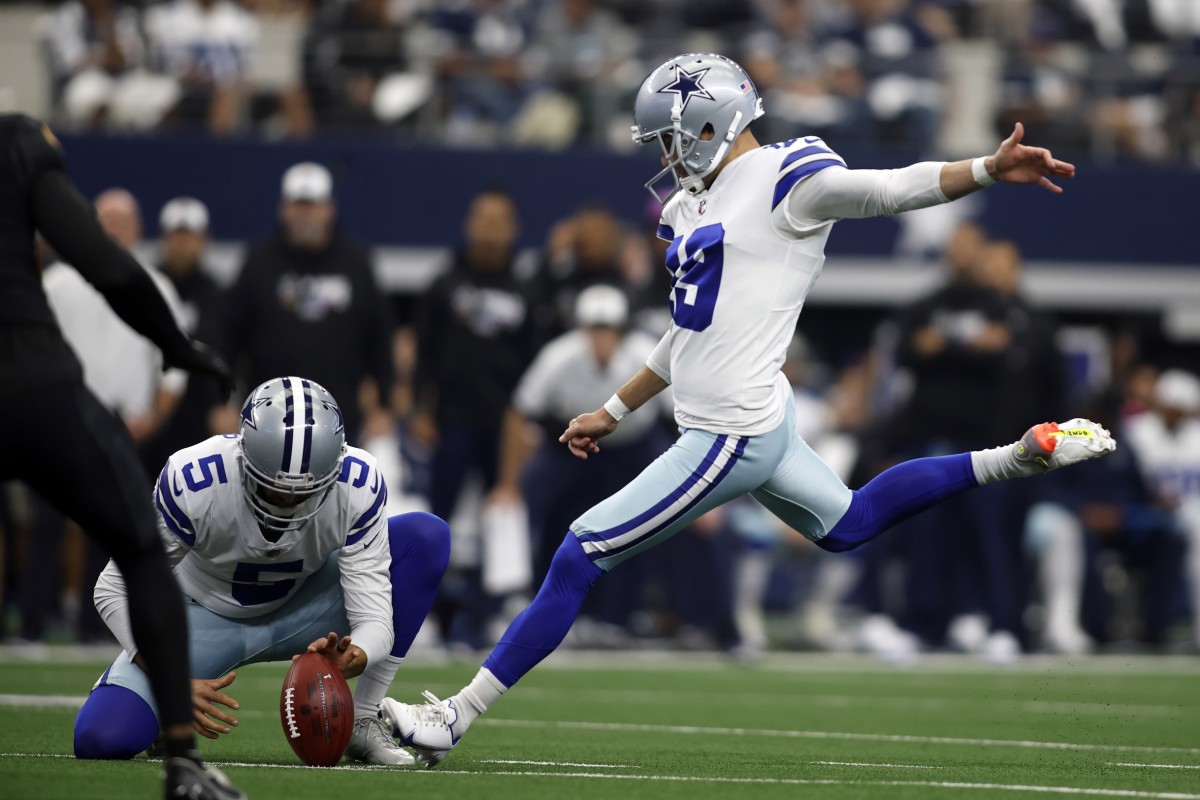 Dallas Cowboys kicker Brett Maher (19) kicks a field goal against Washington Commanders. Mandatory Credit: Tim Heitman-USA TODAY Sports